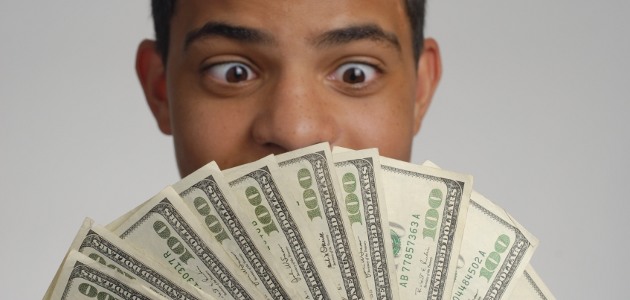 gar�on avec liasse de billets